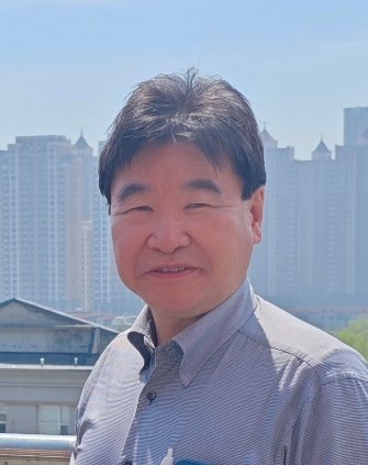 Prof. Keiichi TOMISHIGE